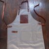 pechera gris,delantal gris con cuero,uniformes para restaurantes,uniformes para hombre y mujer